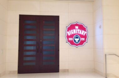 a door with a sign on the wall