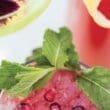 close-up of a drink with mint leaves