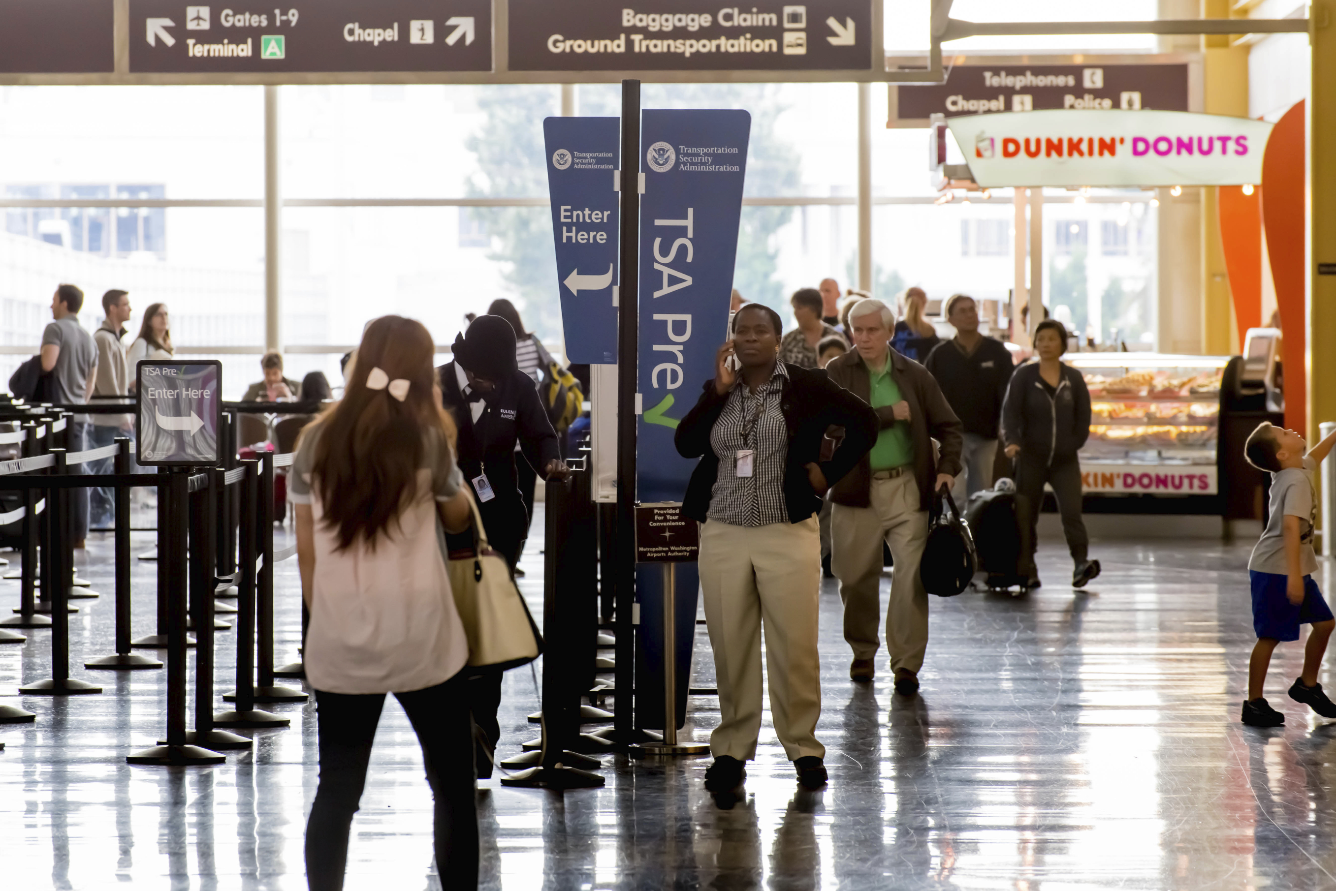 a group of people in an airport