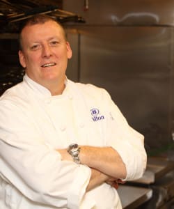 a man in a chef's uniform