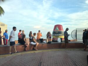 Tourists gather here at the marker that notes the southernmost point in the USA.