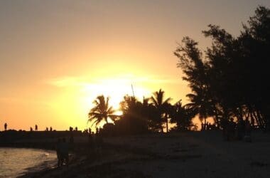 a sunset over a beach