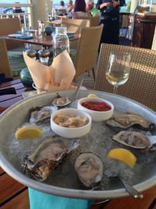 Cold oysters and a cold white wine hit the spot at the Hyatt's Shor restaurant, which serves sustainable fish and seafood.