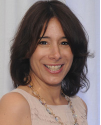 a close-up of a woman smiling