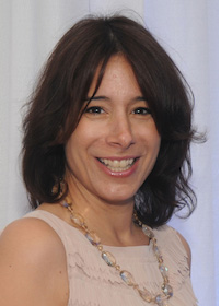 a close-up of a woman smiling