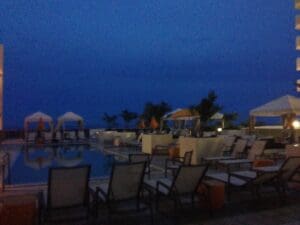 Night-time view of the pool at the Hilton Cabana.