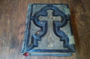 a book with a cross on it