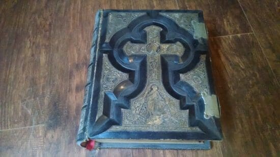 a book with a cross on it