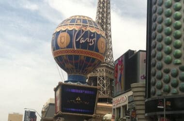 a large hot air balloon on top of a tower