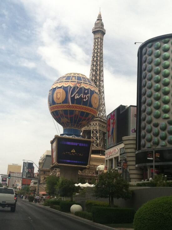 a large hot air balloon on top of a tower