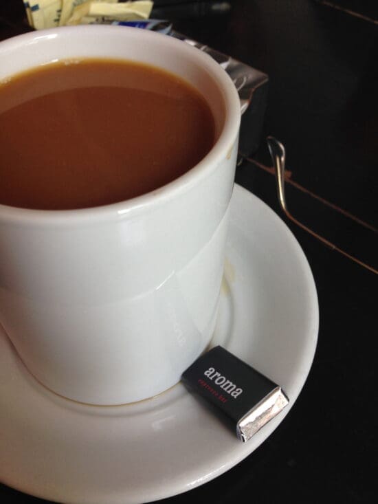 a cup of coffee on a saucer