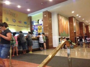 Tourists line up to book tours and buy attraction tickets at the Hotel Pennsylvania.
