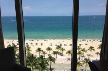 a view of a beach from a window