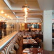 a restaurant with tables and chairs