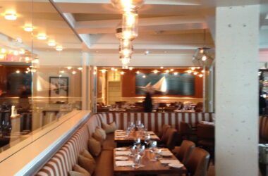 a restaurant with tables and chairs