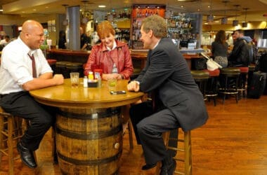 a group of people sitting at a table