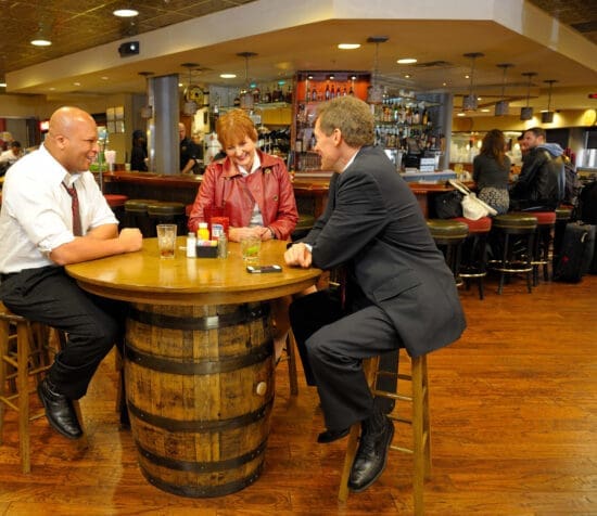 a group of people sitting at a table