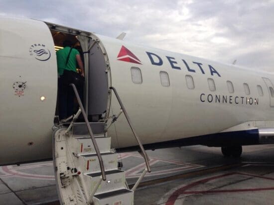 a man boarding an airplane