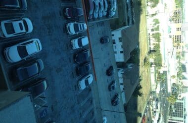 a parking lot with cars parked in it