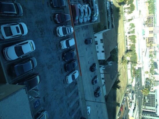 a parking lot with cars parked in it