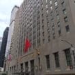 a building with flags on the side