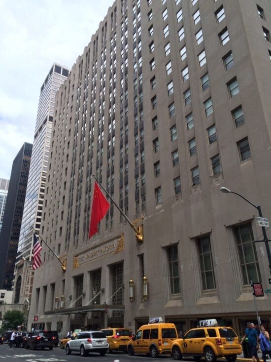 a building with flags on the side