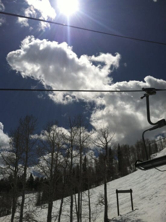 a ski lift on a snowy mountain