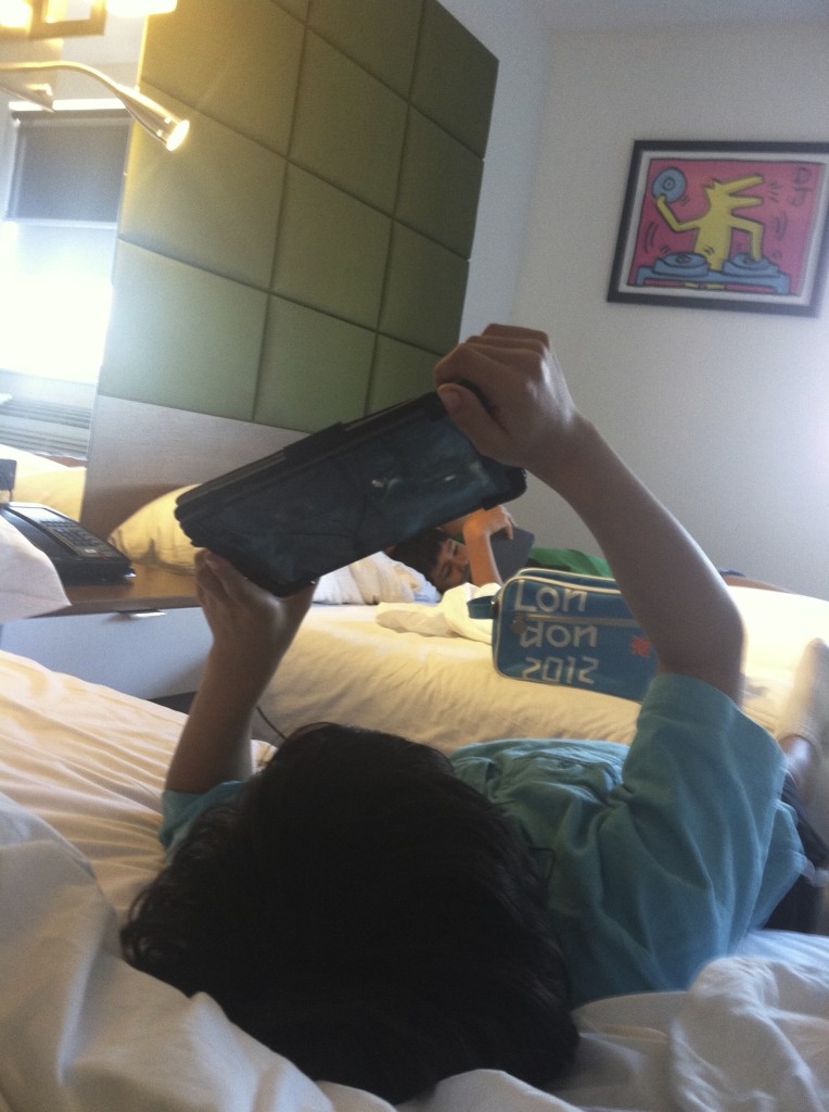 Children with mobile devices sucking up free WI-Fi at the Hotel BPM in Brooklyn. Photo by parent, Barb DeLollis.