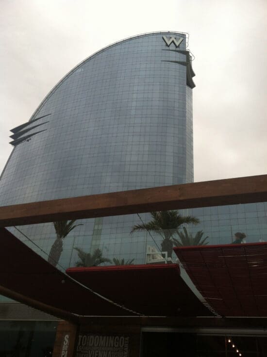 a building with a curved glass surface