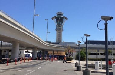 a road with a tower in the background