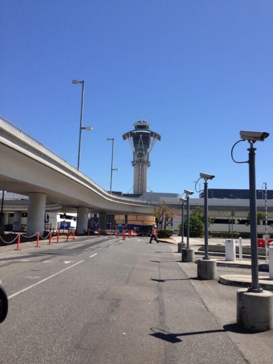 a road with a tower in the background