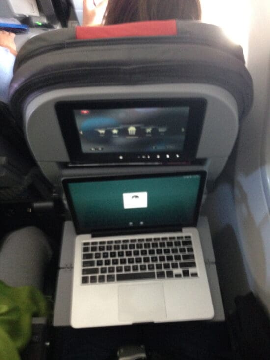 a laptop on a plane