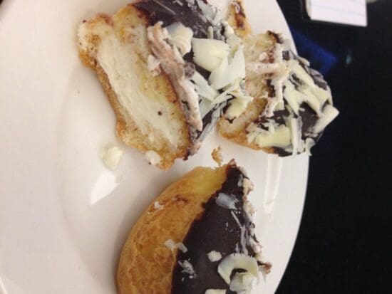 a plate of pastries with chocolate and white chocolate