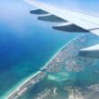 an airplane wing and water