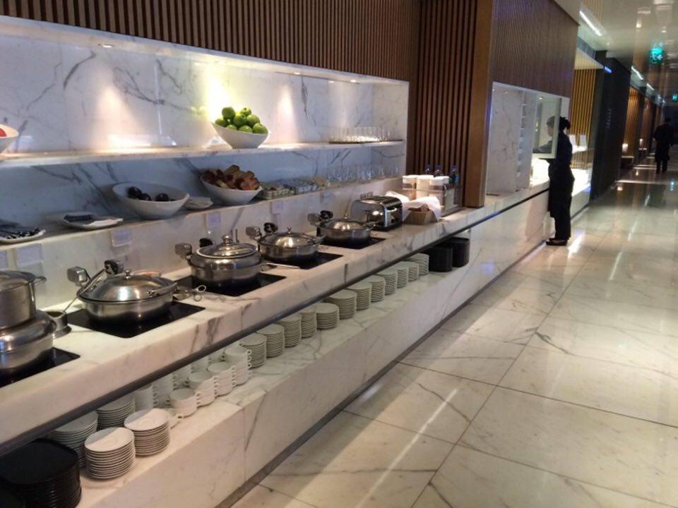 a buffet line with food on the counter