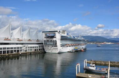 a cruise ship docked at a dock