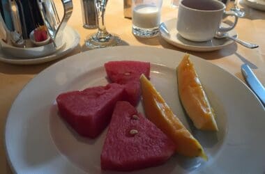 a plate of watermelon and melon slices