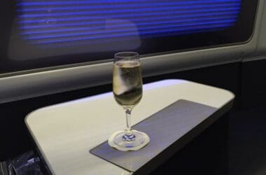 a glass of wine on a table