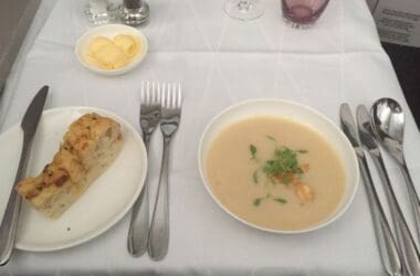 a plate of soup and bread on a table