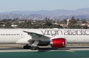 a white airplane on a runway