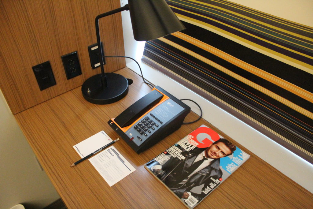 A desk in a hotel room at Aloft Las Colinas hotel