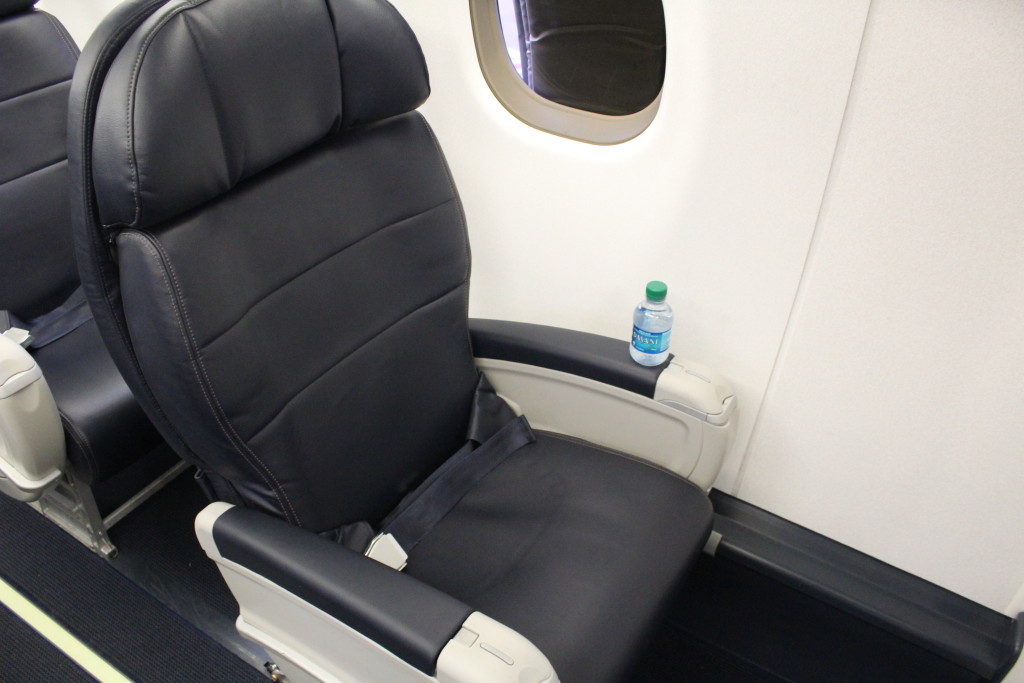 Seat 1A in first class on an Alaska Airlines Embraer E175