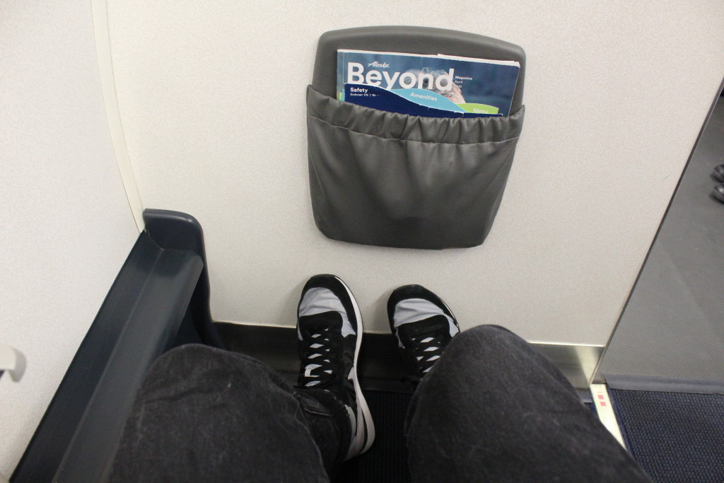 View of legroom from seat 1A on an Alaska Airlines E175