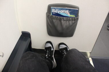 View of legroom from seat 1A on an Alaska Airlines E175