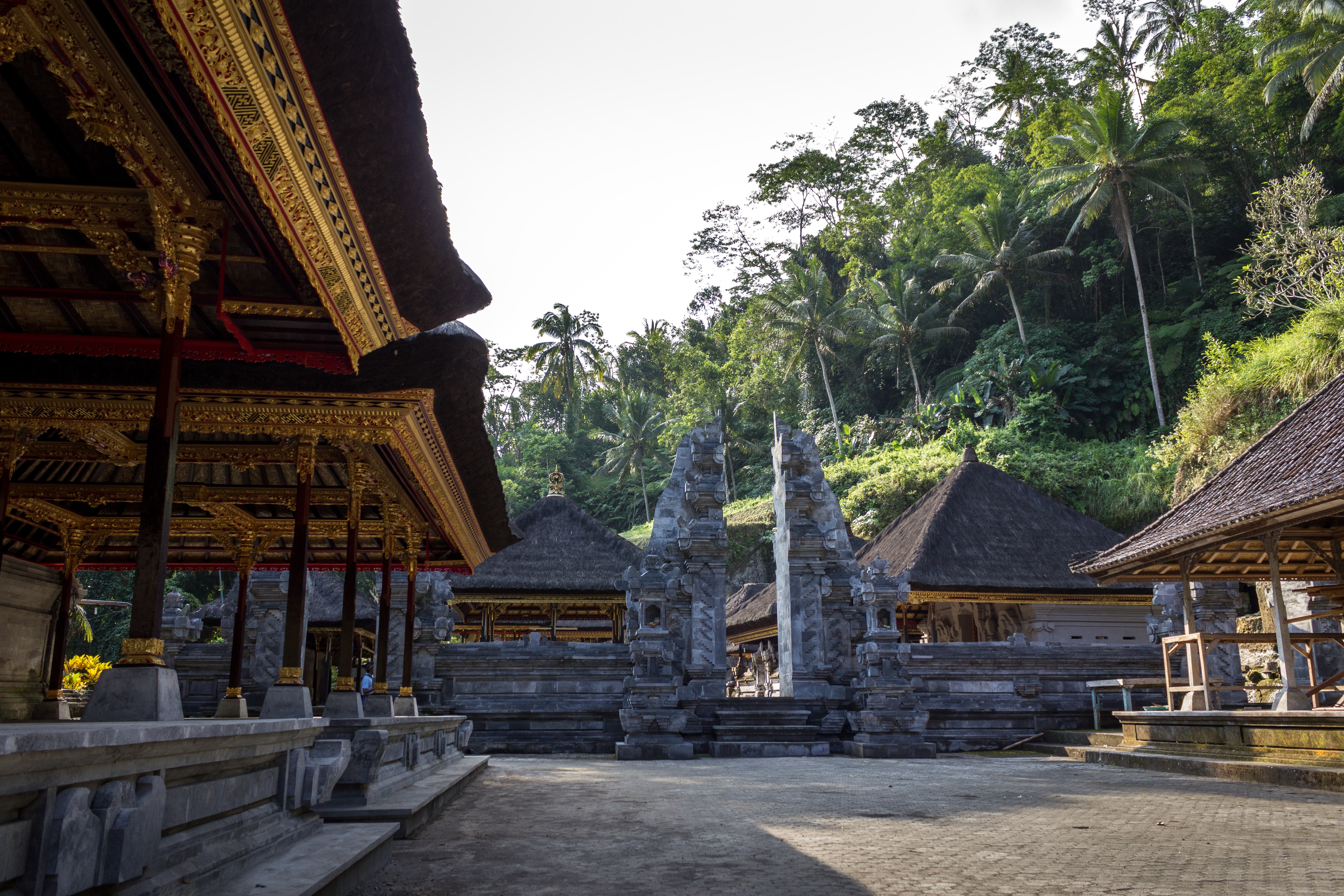 a stone structure with a gold trim