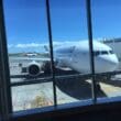 a large white airplane parked at an airport