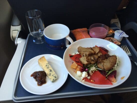 a plate of food on a tray