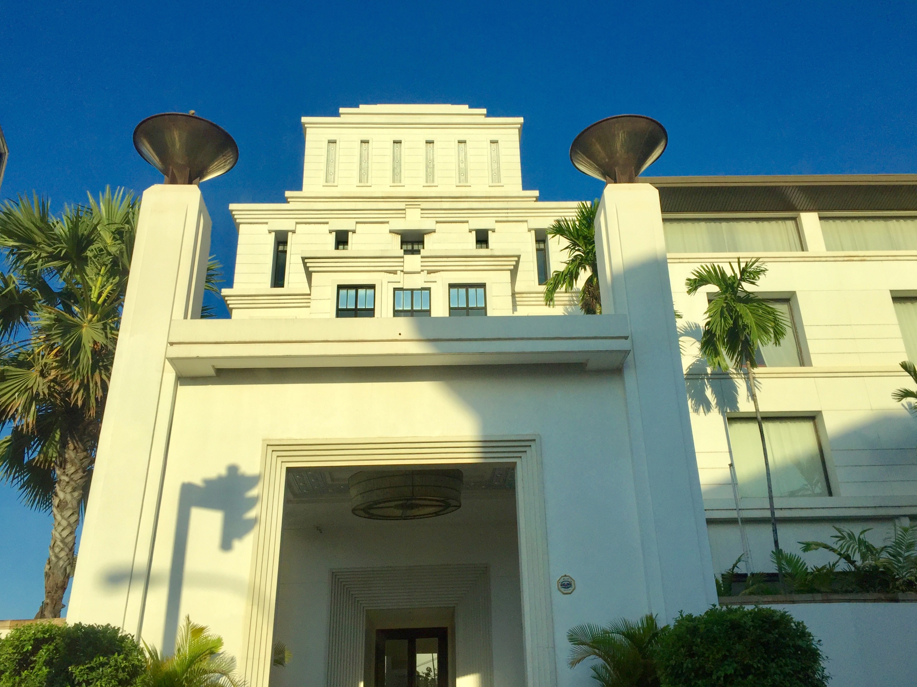 a white building with a large doorway