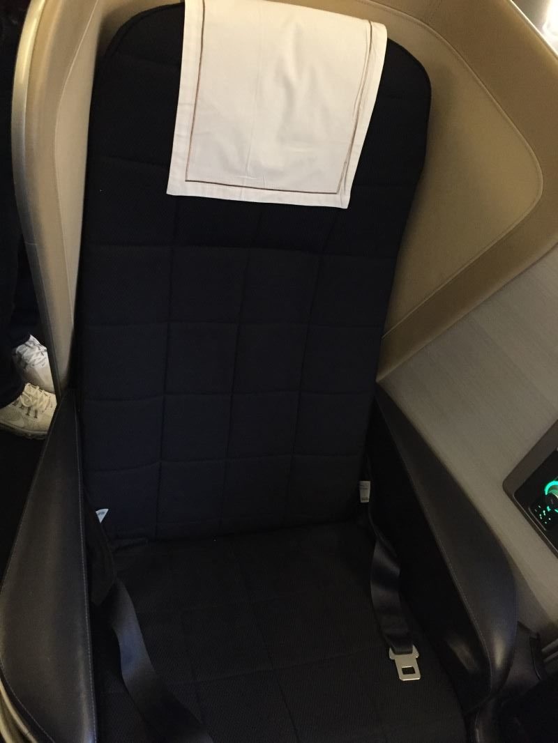 a seat with a white cloth on it