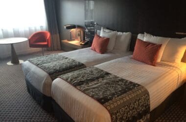 a hotel room with two beds